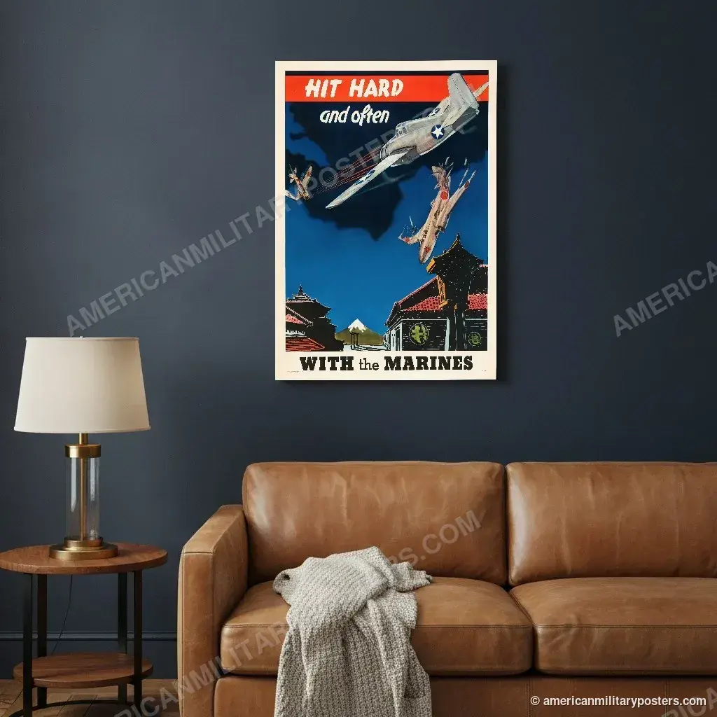 Hit Hard and Often With the Marines poster, unframed print on a navy living room wall above a leather sofa