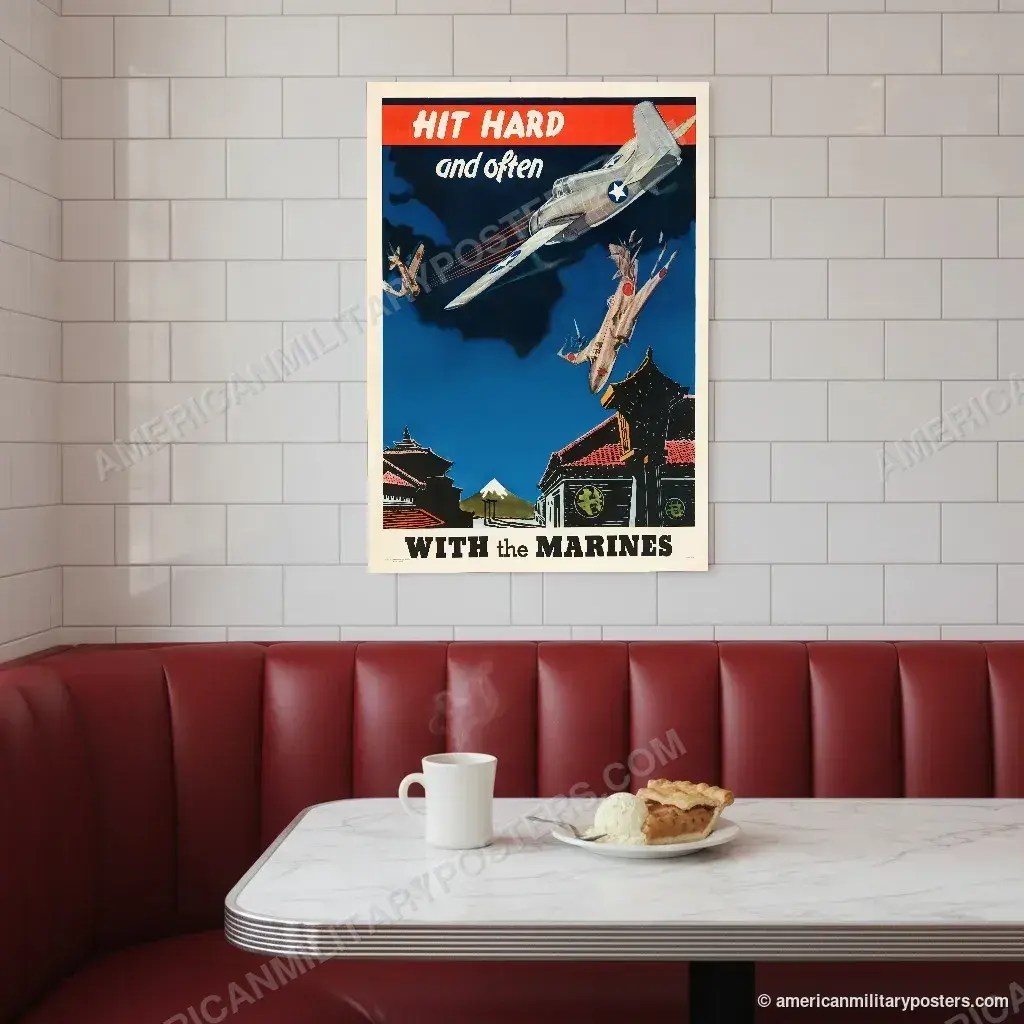 Hit Hard and Often With the Marines poster, unframed print on a tiled wall above a retro diner booth
